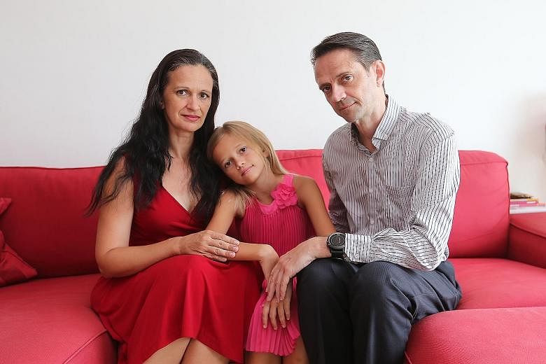 Ms Hajas with her husband John Neilson and daughter Trinity. The family will be spending Mother's Day today at Sentosa, as Ms Hajas and Trinity train for a race next weekend. Muhammad Suhaimi Sabastian's body was found three hours after he and his th
