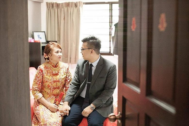 Ms Goh Chieh Ting and her husband on their wedding day last year. The 25-year-old woman, who was six months pregnant, was on her way to the market with her mother-in-law last Saturday morning when she was hit by a lorry.