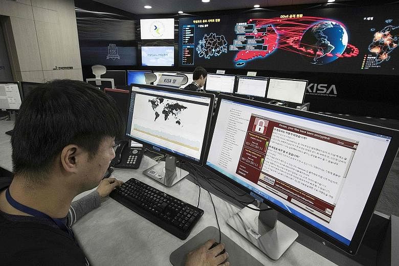 Staff at the Korea Internet and Security Agency in Seoul monitoring the spread of ransomware attacks on Monday. WannaCry has hit more than 300,000 computers worldwide.
