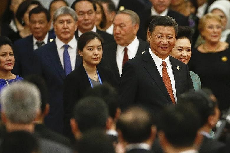 President Xi Jinping and his wife Peng Liyuan (on his left) arriving for the welcoming banquet for the Belt and Road Forum at the Great Hall of the People in Beijing on Sunday.