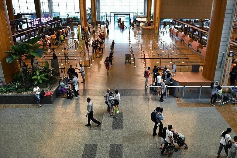 Activity at Changi Airport Terminal 2's departure hall could be seen picking up at 8.45am yesterday, as normal operations resumed after a fire on Tuesday evening forced an evacuation of the terminal for about five hours.