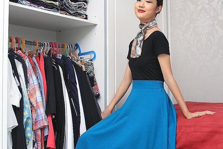 Ms May Anne Pek goes for colourful and sweet-looking clothes and accessories.