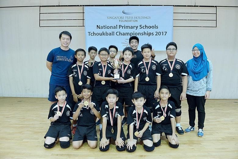 The triumphant Junyuan Primary tchoukball team with their trophy. They beat Greendale Primary 14-11 in the final.
