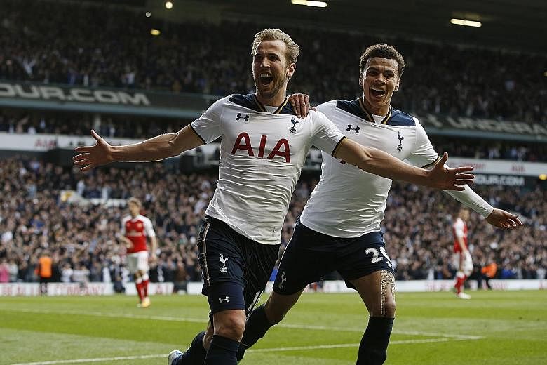 Tottenham Hotspur's home-grown duo Harry Kane (left) and Dele Alli celebrate their side's second goal in the emphatic 2-0 victory against Arsenal on April 30. The win enabled Spurs to finish above Arsenal in the English Premier League for the first t