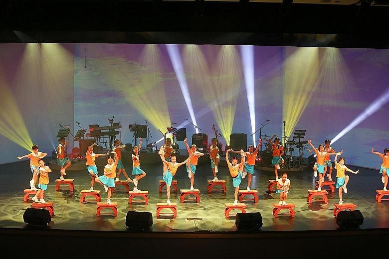 Dancers from the Singapore Hokkien Huay Kuan Arts and Cultural Troupe performing at the opening of the SCCC yesterday.