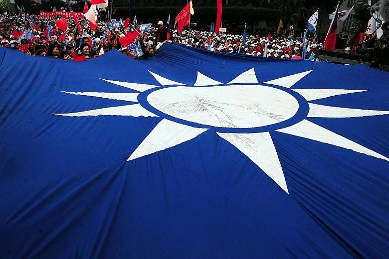 This picture, taken on Jan 8, 2012, shows a Kuomintang flag on display at an election campaign rally in Taipei. The party vowed to reform after a crushing defeat in elections last year, but it is still struggling to find its feet.
