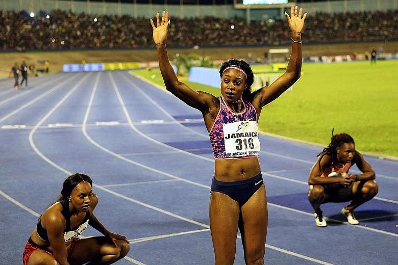 Elaine Thompson celebrating her 200m win. She matched the season's best of 22.09sec a week after setting the 2017 world-leading 100m time.