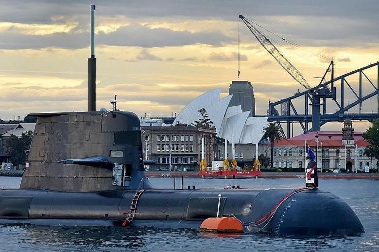 A Royal Australian Navy submarine in Sydney Harbour. Australia's naval shipbuilding plan unveiled last week marks the biggest boost to the navy since World War II.