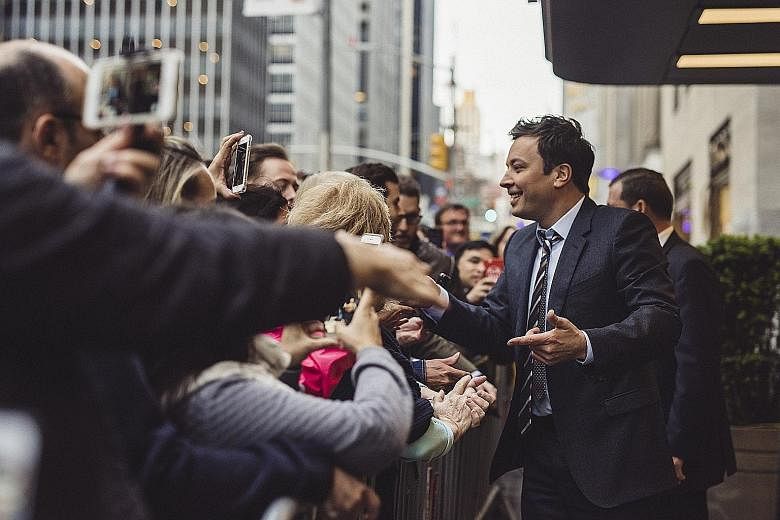 The Tonight Show host Jimmy Fallon greeting fans outside Rockefeller Center in New York City earlier this month.