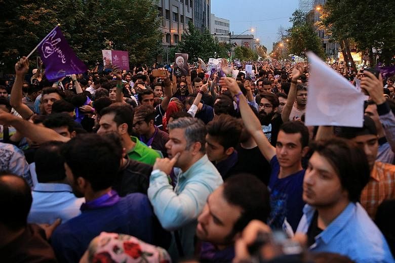 Supporters of Iranian President Hassan Rouhani took to the streets of Teheran last Saturday to celebrate his victory. The cleric, who was first elected in 2013, won 57 per cent of the vote in the presidential election last Friday.