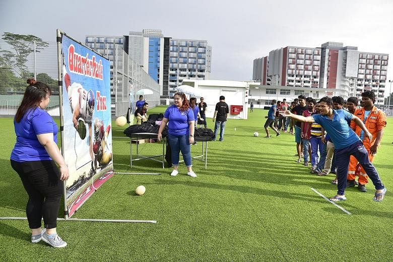 About 10,000 migrant workers played games and enjoyed performances at the May Day Migrant Workers' Celebration yesterday at Sungei Tengah Lodge, a new migrant workers' dormitory in Chua Chu Kang. The event capped the labour movement's month-long May 