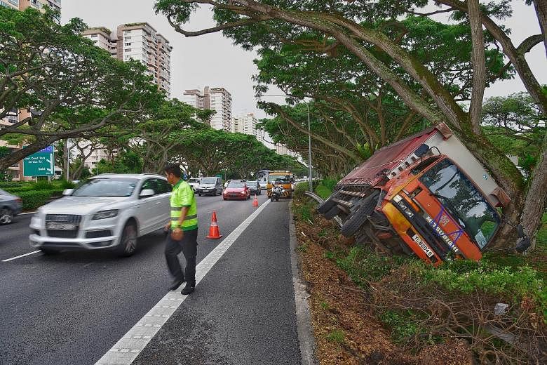 A person was taken to Changi General Hospital after a truck toppled over along East Coast Parkway towards the city yesterday. The vehicle appeared to have fallen into a ditch. 	The Singapore Civil Defence Force told The Straits Times that it was aler