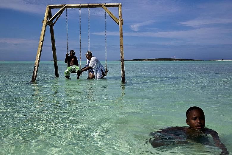 A swing set that was built for the Fyre Festival at Coco Plum Beach in Exuma, Bahamas.