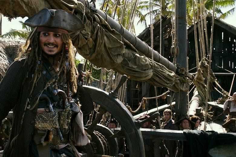 Johnny Depp in Pirates Of The Caribbean 5: Salazar's Revenge. The film is marked by a large action setpiece every 10 minutes and packed with ghostly visual effects.