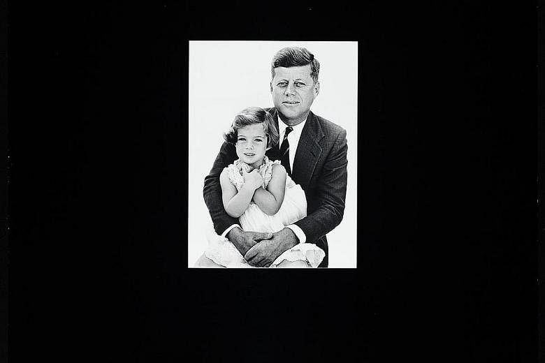 Ms Caroline Kennedy said in a video on CNN that her father's legacy still lives on. Mr John F. Kennedy and Caroline in a 1961 photo. The 100th anniversary of his birth is on Monday.