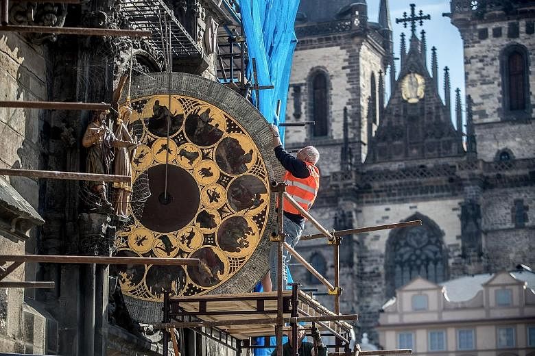 The calendar clock from Prague's Old Town astronomical clock was dismantled by clockmaker Petr Skala yesterday, during the ongoing renovation of the Old Town Hall tower at the Old Town Square in the Czech Republic's capital. The astronomical clock wi