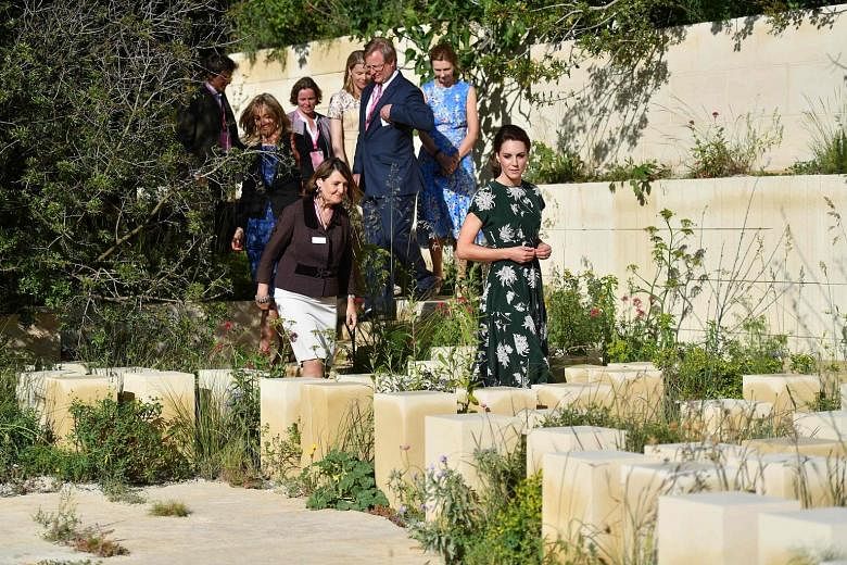 Visitors turned out in droves to view the lush show gardens at the Royal Chelsea Hospital grounds. The award-winning M&G Garden, which was visited by Duchess of Cambridge Catherine (right).