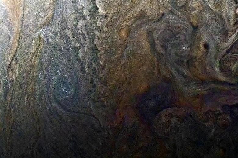 Jupiter's south pole (far left) as seen by the Juno spaceship, and an enhanced-colour image (left) of a mysterious dark spot on Jupiter which is a Jovian "galaxy" of swirling storms.
