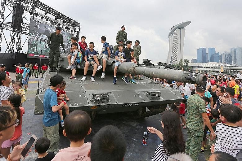 Close to 33,000 visitors made their way to the F1 Pit Building yesterday to get up close with the army's latest vehicles and weaponry at the Army Open House 2017. Due to the overwhelming response, the two-day Open House, which was scheduled to end to