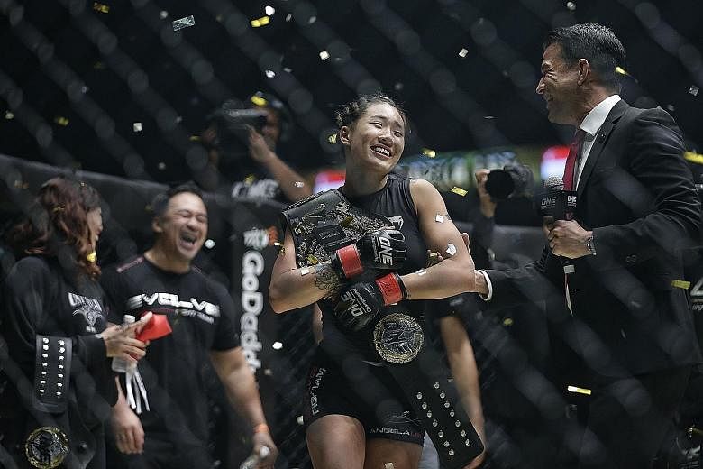 One Championship women's atomweight world champion Angela Lee "living the dream" as she retained her title at the Dynasty of Heroes event at the Singapore Indoor Stadium on Friday night. The mixed martial arts star defeated Brazil's two-time muay tha