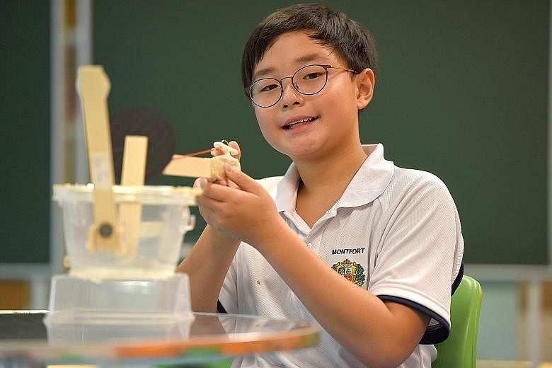 Shane Pan built a magnetic rubber-band gun in about four hours using mostly household objects, such as plastic tubs, clothes pegs and fridge magnets. Primary 1 Montfort Junior pupils enjoying their time in the school's Lego Room. It is part of the sc