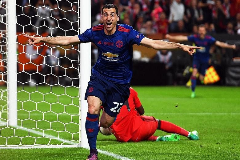 Henrikh Mkhitaryan celebrates scoring the second goal in the Europa League final. The Armenian is the first from his country to win a major European trophy, and hopes more will follow in his path.