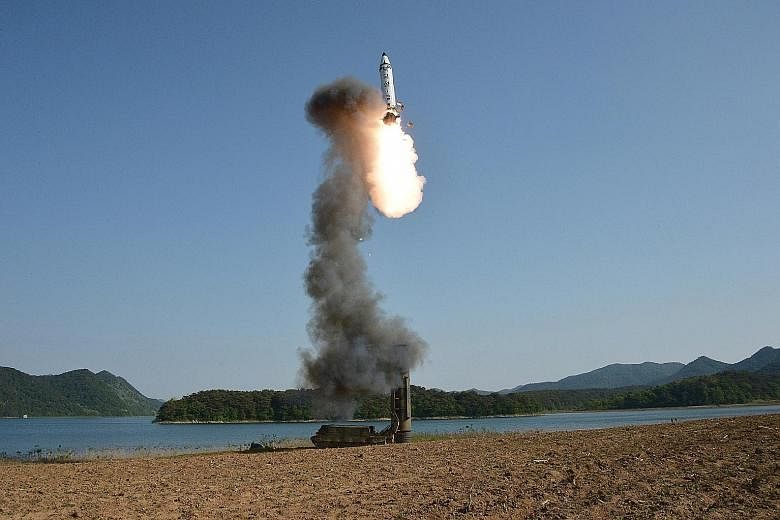 A medium-to-long-range missile under test in North Korea on May 22.