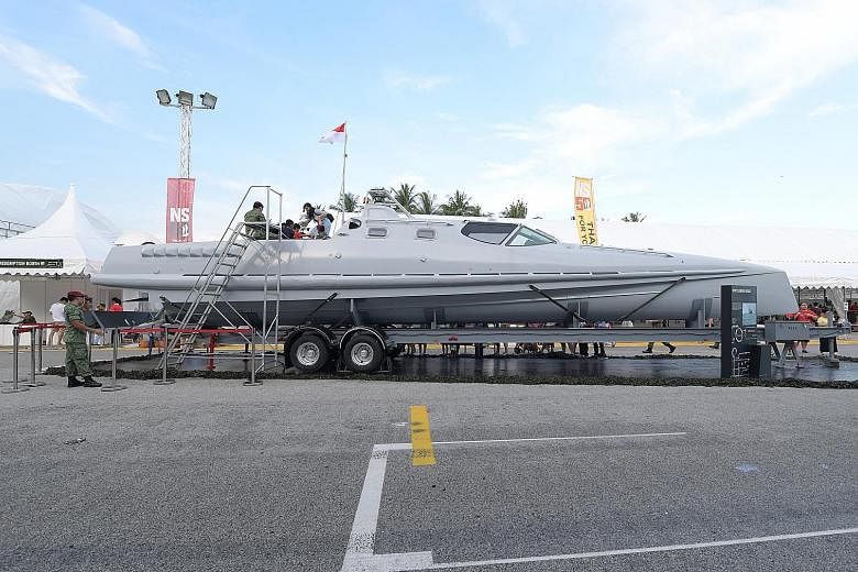 The Very Slender Vessel, a 16m-long, 2.4m-wide and 2.5m-tall vessel used by commandos for high-speed interdiction missions at speeds of more than 40 knots, being displayed at the Army Open House yesterday.