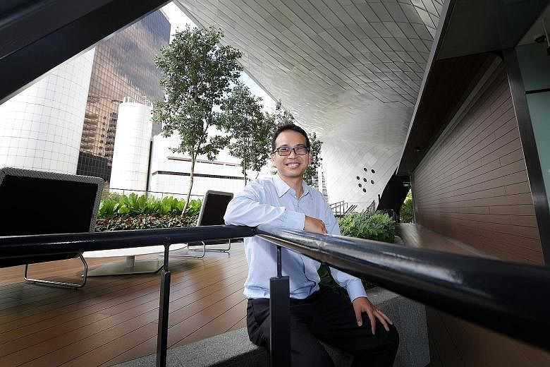 Mr Aaron Foong at The Scotts Tower. The design of the condominium with an elevated floor plate frees up space on the lower storeys for an "open view" and room for residents to move around, he says.