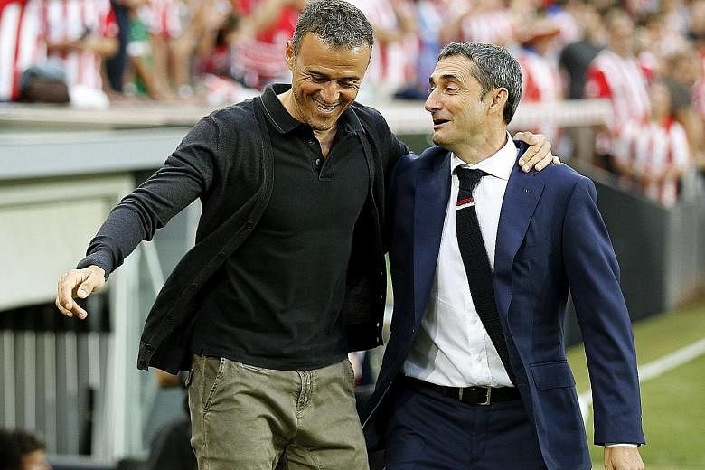 Rival coaches last August when Bilbao hosted Barcelona in a Primera Liga game, Ernesto Valverde (right) has now replaced Luis Enrique in the Barca hot seat and has a huge task reviving their fortunes.