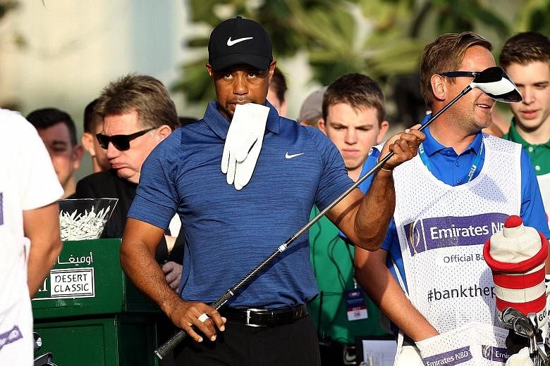 Tiger Woods pulled out of the Dubai Desert Classic due to back spasms prior to the second round. His surgery last month has a typical six-month recovery period.