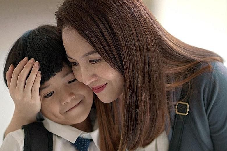 In Daniel Yam's short film, Time, Adele Wong plays a mother who realises that she should cherish the time with her son, played by Ryan Soo (both above), during his growing-up years.