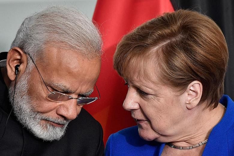 Prime Minister Narendra Modi and Chancellor Angela Merkel agreed on German aid and investments worth $1.54 billion a year.