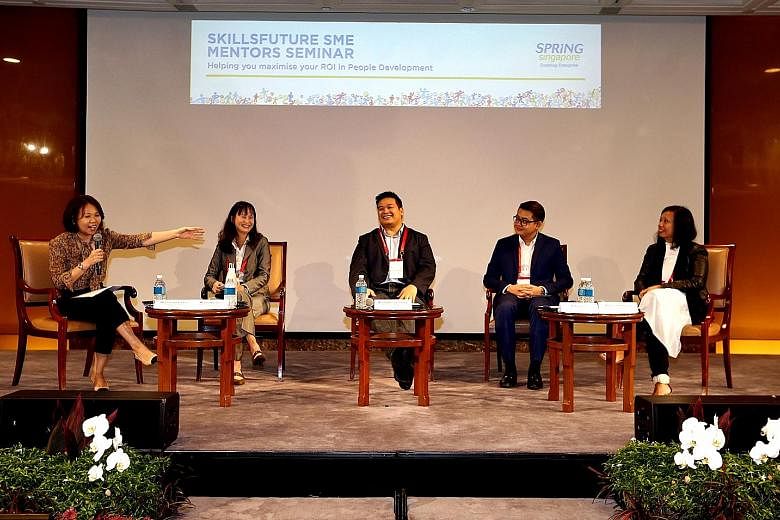 The panel comprised (from left) Ms Christophane Foo, Spring Singapore's executive director for human capital; Ms Lim Hee Joo, executive director of Wah Son Engineering; Mr Sherwin Siregar, chief executive officer at Atlas Sound and Vision; Mr Alex Ch