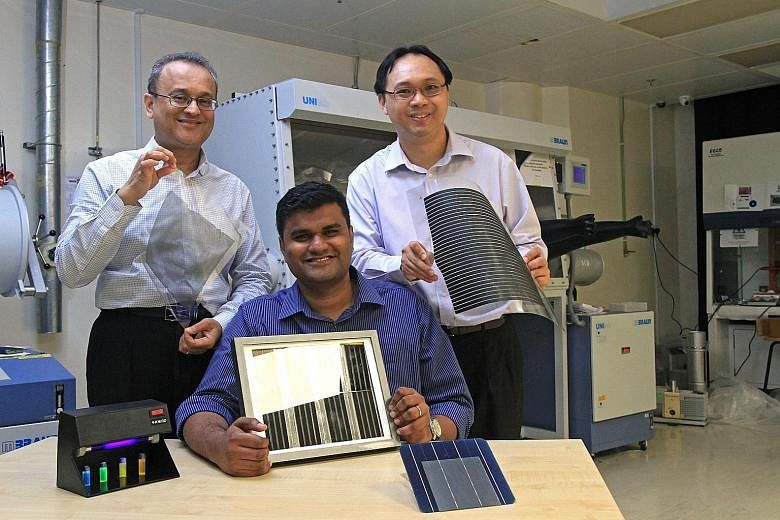 (From left) Professor Subodh Mhaisalkar, Assistant Professor Nripan Mathews and Associate Professor Sum Tze Chien, whose research shows the material perovskite can be printed onto glass or plastic sheets.