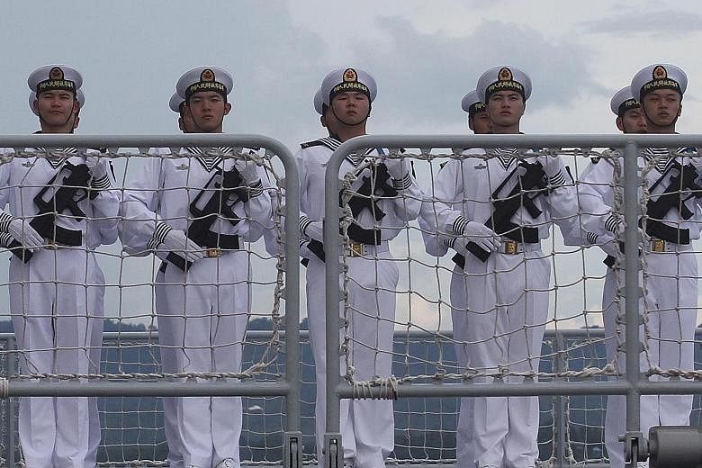 Sailors on board a Chinese ship visiting Davao city, Philippines, on April 30. President Xi Jinping is making preparations to be able to project force into the Indian and Pacific oceans.