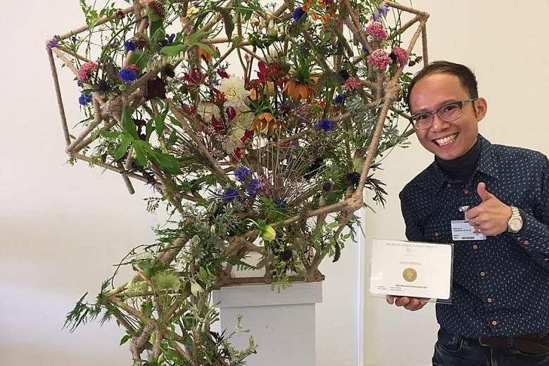 Mr Keith Lin and his lauded work, A Journey To Find Myself, which features bamboo stems wrapped with twine and covered in foliage and flowers in a riot of colours.