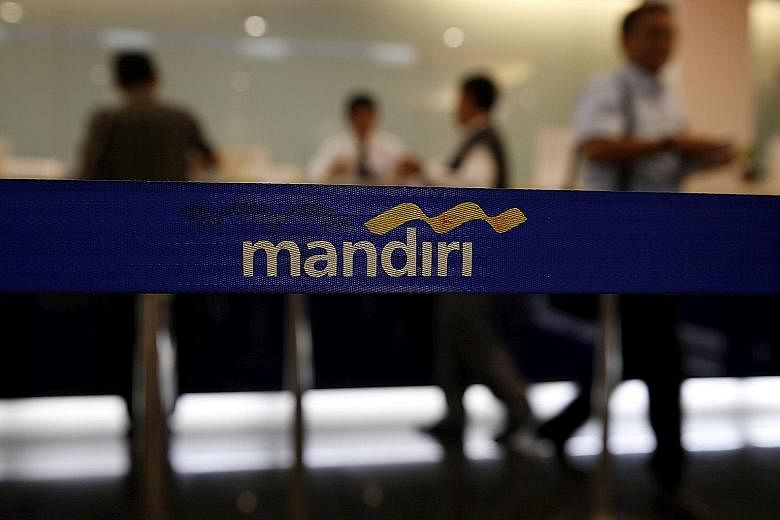 A Bank Mandiri branch at Plaza Mandiri in Jakarta. The bank's chief executive Kartika Wirjoatmodjo said recent reforms in Indonesia have made ultra-rich citizens less averse to banking with state-owned institutions.