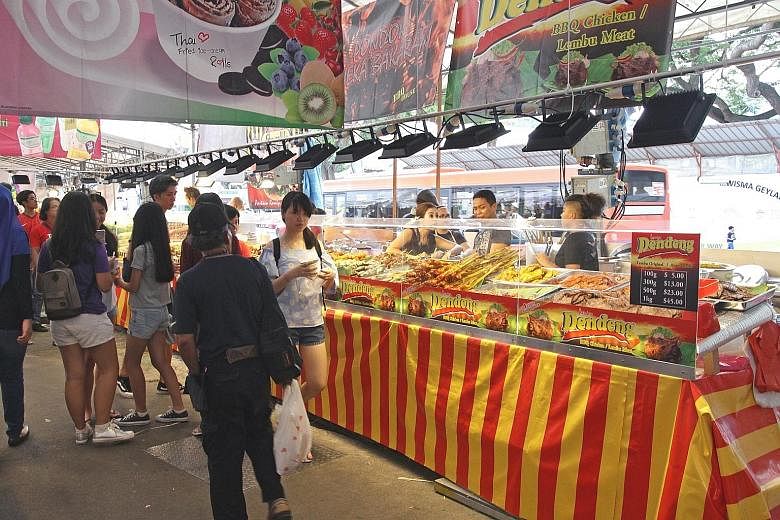 It costs between $16,000 and $20,000 to rent a stall at the Geylang Serai Bazaar. One stall owner says illegal workers are paid $40 to $80 a day, whereas locals are paid $80 to $100 a day.