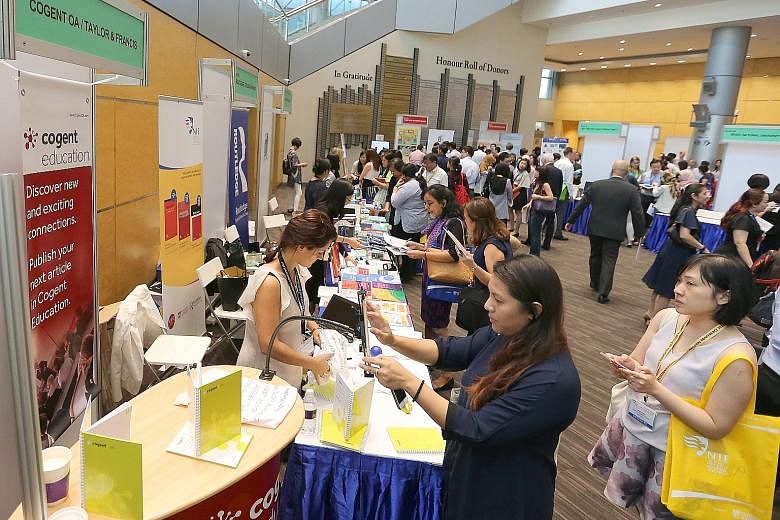A showcase at last week's Redesigning Pedagogy International Conference. There were seven booths featuring publishers and education vendors and two school showcases put up by Yusof Ishak and Teck Whye secondary schools. (From left) Prof David Carr, P