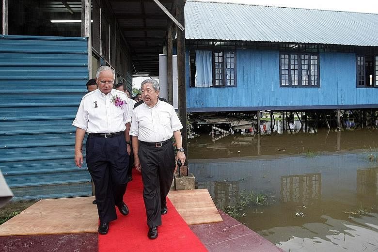 Mr Najib Razak and Mr Bustari Yusof at a school visit in 2008. Mr Bustari is said to act as the Malaysian Prime Minister's senior political counsel, chief troubleshooter and economic adviser. He is also said to be one of Mr Najib's closest friends an