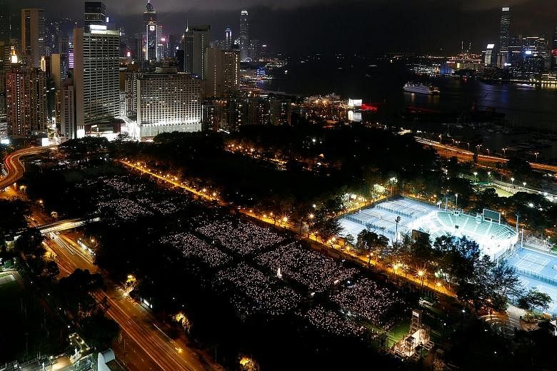 Tens of thousands of people taking part in a candle-light vigil to mark the 28th anniversary of the Tiananmen crackdown. Student unions continued their boycott of the vigil, saying its message is increasingly irrelevant to Hong Kong.