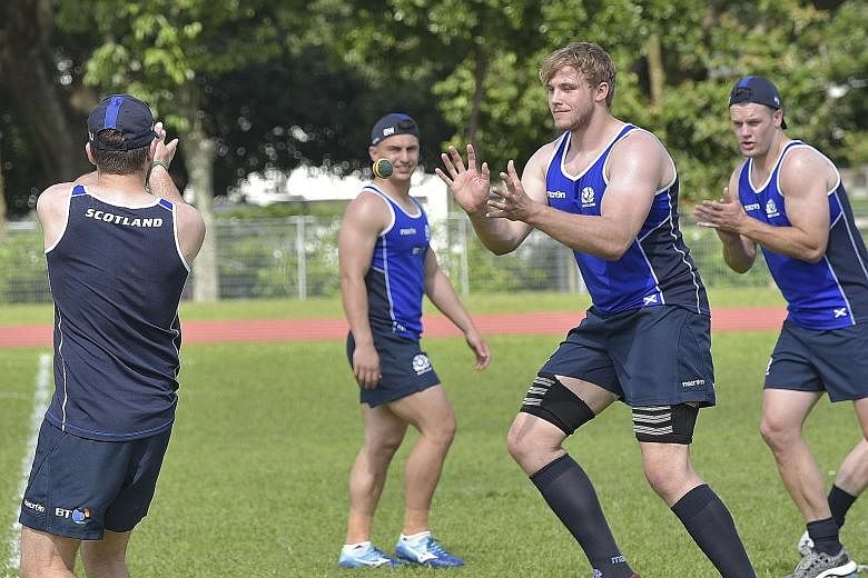Scotland's rugby team at a public training session yesterday, ahead of their Test match against Italy at the National Stadium on Saturday. New coach Gregor Townsend wants his side to play with freedom.