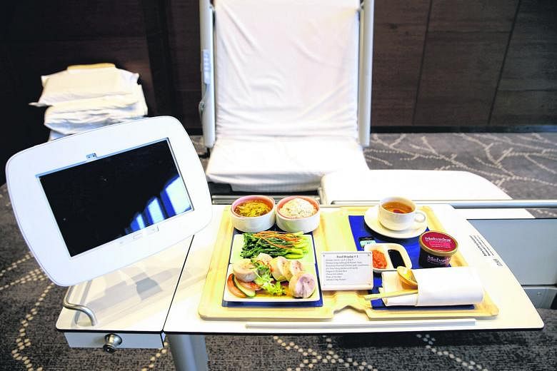 At Farrer Park Hospital, patients can shop on wireless tablets and have purchases delivered to their bedside within 30 minutes. The hospital also shares its kitchen with the adjoining One Farrer Hotel and Spa, said the hospital's chief executive, Dr 