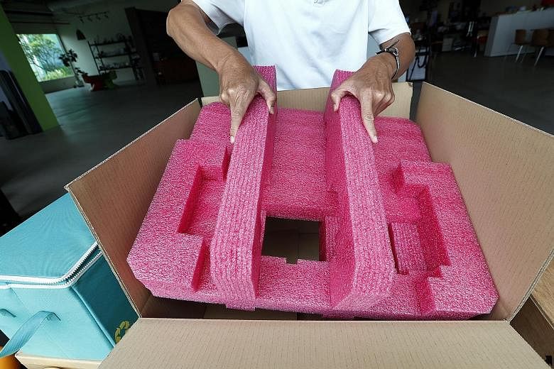 A paper carton box with polyurethane foam used by Greenpac, which helps reduce packaging waste. The firm was among 11 multinational companies and five SMEs that won Singapore Packaging Agreement awards for their efforts to cut packaging waste.