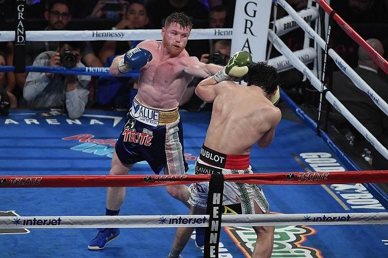 Mexico's Saul Alvarez landing clean punches on compatriot Julio Cesar Chavez Jr in a comfortable unanimous decision win. The middleweight boxer will be hoping to cement his legacy against the undefeated Golovkin of Kazakhstan, one of the sport's most