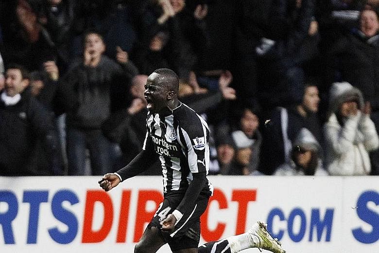 Cheick Tiote celebrating after scoring Newcastle's equaliser against Arsenal in the amazing 4-4 draw back in 2011. The crowd favourite with the Magpies, who are now back in the Premier League, left for China in February.
