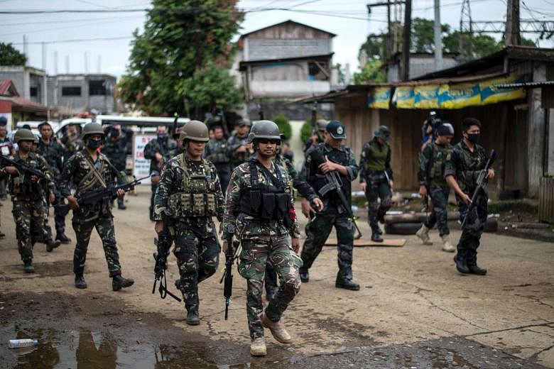 Militants in Marawi siege wanted to set up a Muslim enclave, say ...