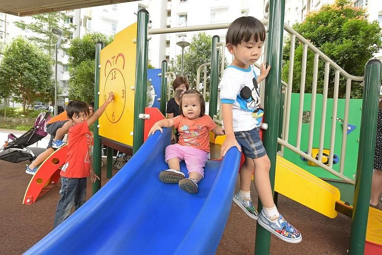 Punggol has more than 70 playgrounds spread across its various HDB developments, as well as the 4.2km Punggol Waterway. Punggol MP Sun Xueling (second from left in the picture on the right) talking to a resident in a children's playground. There are 
