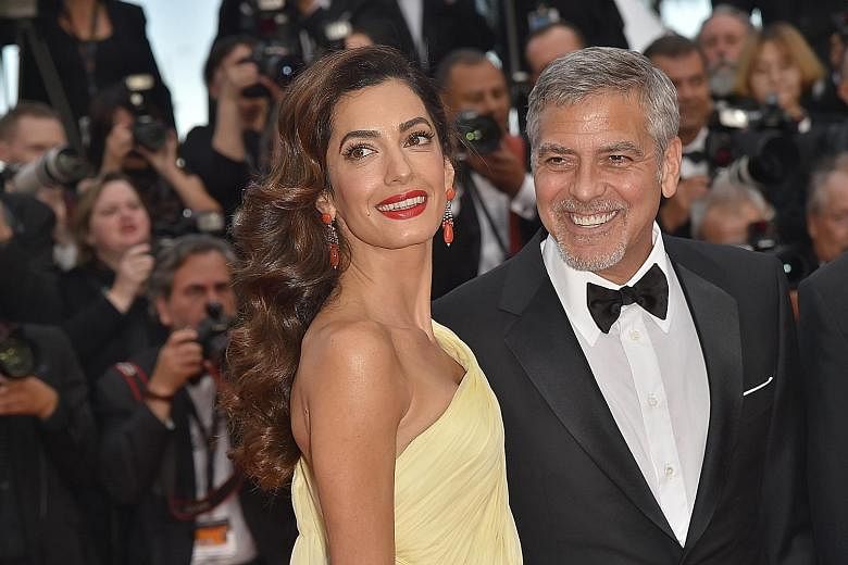 George Clooney and his wife, Amal, at the Cannes Film Festival in France in May last year.